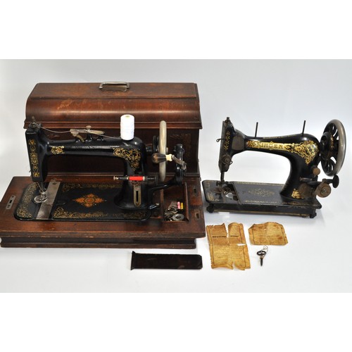 81 - Kimball Morton sewing machine  with carry case, instructions and key, together with one other Singer... 