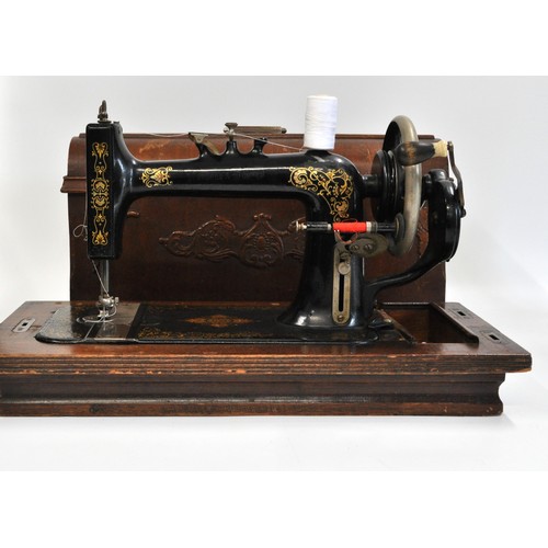 81 - Kimball Morton sewing machine  with carry case, instructions and key, together with one other Singer... 