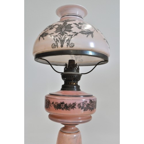 91 - Victorian pink opaline glass table oil lamp, approx 50cms tall, complete with chimney and shade