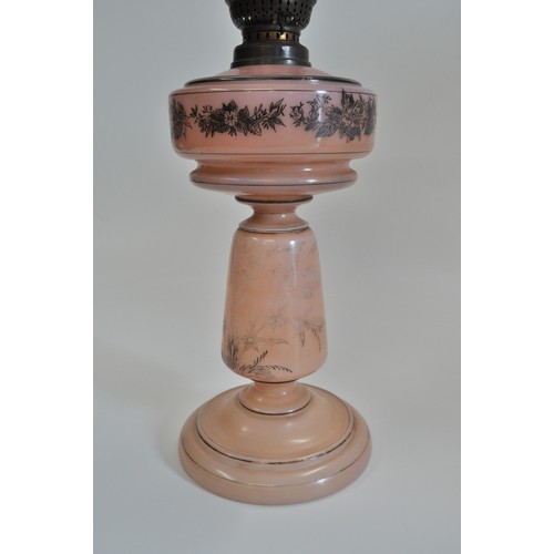 91 - Victorian pink opaline glass table oil lamp, approx 50cms tall, complete with chimney and shade