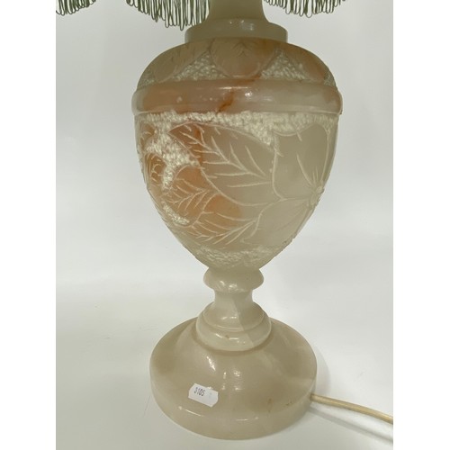 94 - Vintage Onyx Lamp with hand carved floral/leaf design to base, approx H74cm. PAT tested.