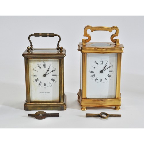 95 - x2 brass carriage clocks both with travelling cases and keys,  white dial with Roman numerals, one i... 