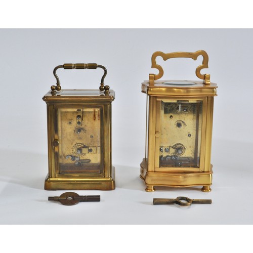 95 - x2 brass carriage clocks both with travelling cases and keys,  white dial with Roman numerals, one i... 