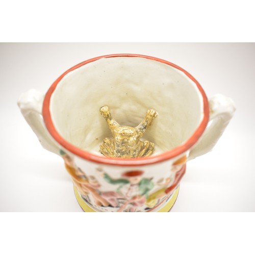 105 - Antique porcelain/ceramic items  to include a twin-handled frog tankard, hand-painted decoration 