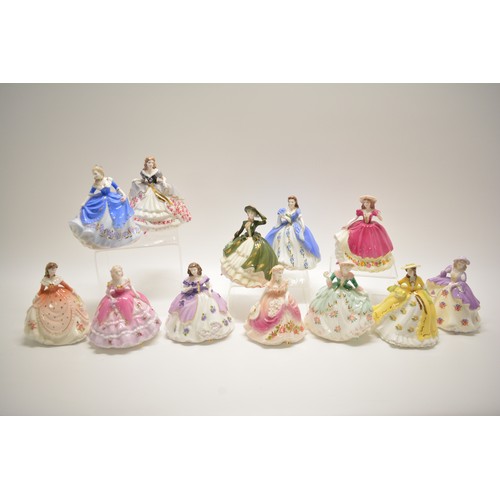 114 - A large group of limited edition Coalport miniature figurines from the Fairest Flowers collection, P... 