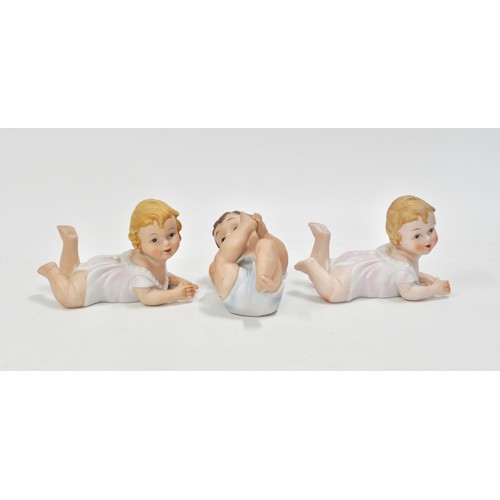 125 - x3 bisque porcelain 'piano' babies