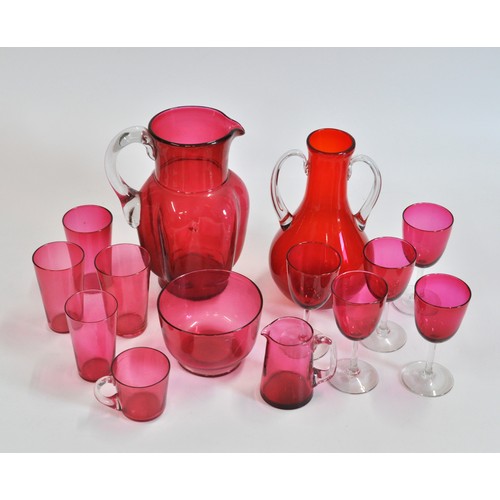 133 - Red glassware grouping to  include jugs, twin handled vase, glasses etc.