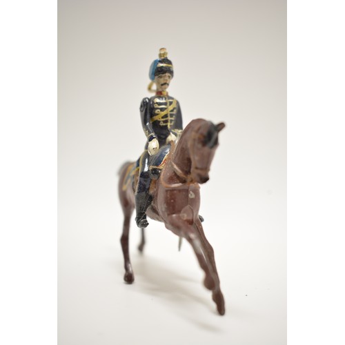 181 - A set of 5 Britains die cast horse mounted riflemen. 8 cm