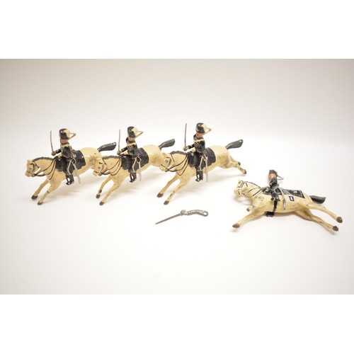 187 - Four Britains die cast cavalry figures. 7 cm. AF.