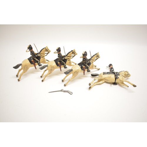 187 - Four Britains die cast cavalry figures. 7 cm. AF.