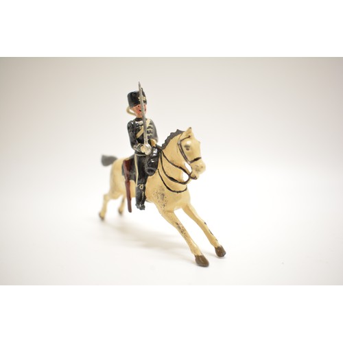 187 - Four Britains die cast cavalry figures. 7 cm. AF.