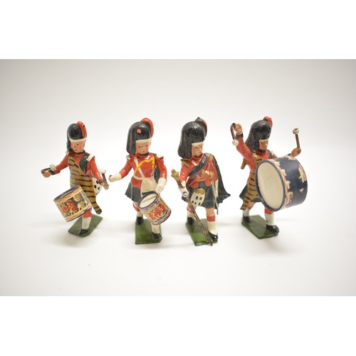 189 - Britains set of 8 die cast black watch parade figures. 6.2 cm.