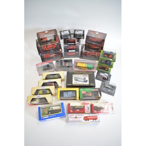 219 - Various boxed model vehicles and makers to include tractors, cars, buses and fire engines, plus Dink... 