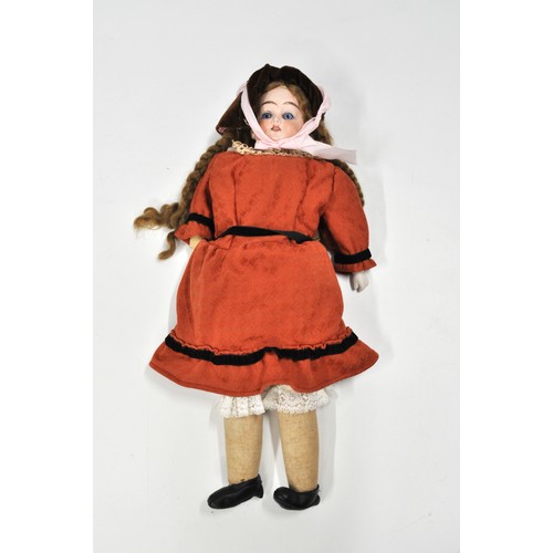 225 - German bisque/fabric/leather doll. Possibly  Cuno & Otto Dressel