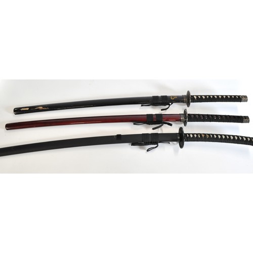 236 - x3 replica samurai sword with scabbards. AF.