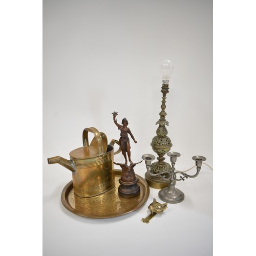 239 - A mixed group of metalware items to include lamp with pierced design, hammered effect circular tray ... 