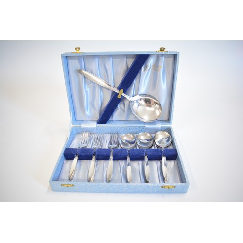 245 - A canteen of FlexFit cutlery and a mixture of boxed cutlery items including napkin rings with duck p... 