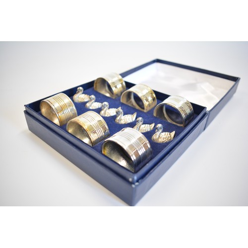 245 - A canteen of FlexFit cutlery and a mixture of boxed cutlery items including napkin rings with duck p... 