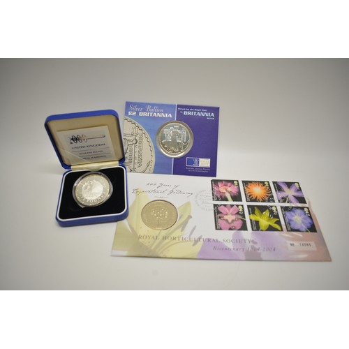 254 - Royal Mint 2000 Millenium Silver £5 coin, Silver Bullion £2 Britannia coin together with limited edi... 