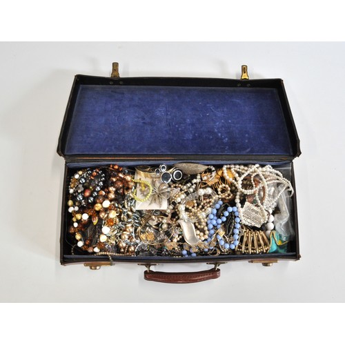 262 - Case containing a large collection of mixed costume jewellery