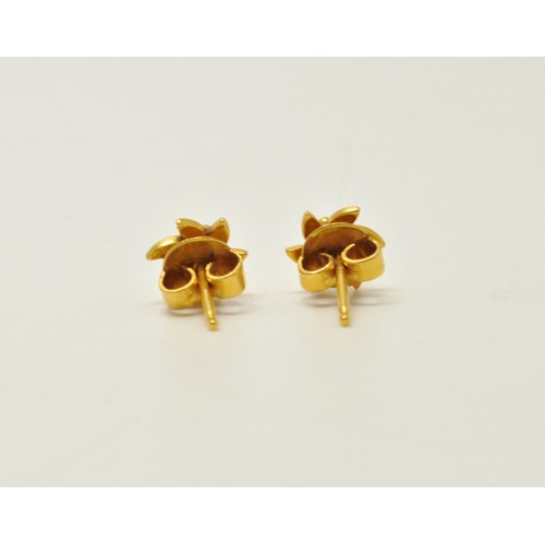 274 - Pair of flower drop design stud earrings, 5.9g. AF stem damaged together with one other flower stud ... 