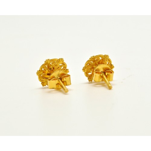 275 - Diamond earrings with screw design to stud (weighing approx 2.3g gross)  together with pair of 22ct ... 