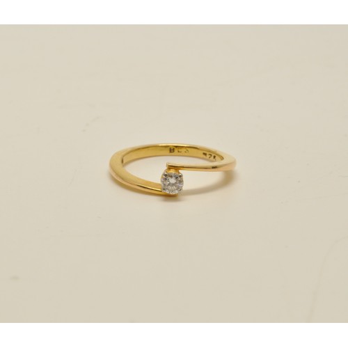 284 - 18ct yellow gold Diamond solitaire ring, cross over band design, approx 0.20ct, 2.8g gross weight, m... 