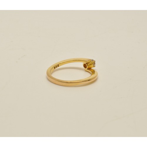 284 - 18ct yellow gold Diamond solitaire ring, cross over band design, approx 0.20ct, 2.8g gross weight, m... 