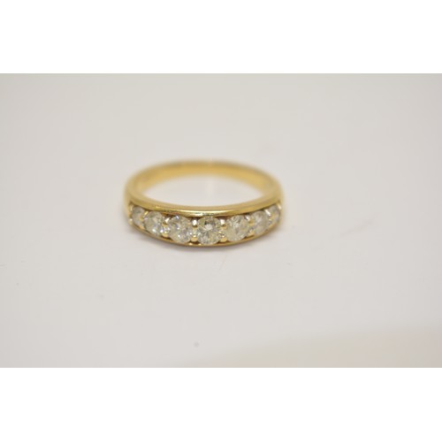 291 - 18ct yellow gold half eternity diamond band, with graduating diamonds. Hallmarked London 750, Approx... 