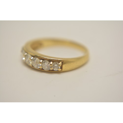 291 - 18ct yellow gold half eternity diamond band, with graduating diamonds. Hallmarked London 750, Approx... 