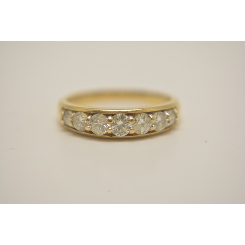 291 - 18ct yellow gold half eternity diamond band, with graduating diamonds. Hallmarked London 750, Approx... 