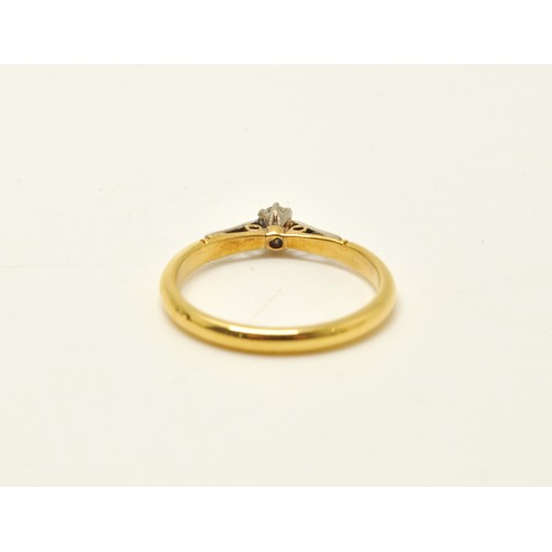 293 - Vintage yellow gold diamond solitaire ring with small diamond chips to raised mount. Approx size N. ... 