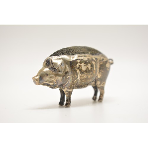 303 - Edwardian silver pin cushion modelled as a pig, hallmarked Chester 1910. AF.