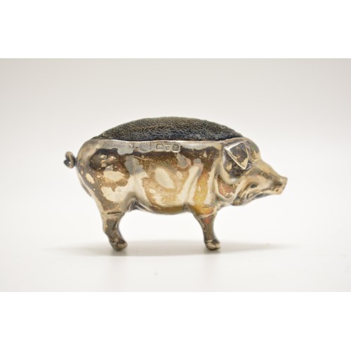 303 - Edwardian silver pin cushion modelled as a pig, hallmarked Chester 1910. AF.