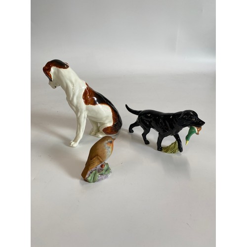 311 - Royal Worcester hunting dog with game plus two other Royal Worcester figures