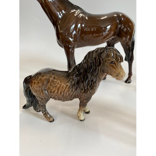 313 - A BESWICK Shetland mare model No. 1033, stands 14cm high, Beswick Stallion 1564, together with x2 Ro... 