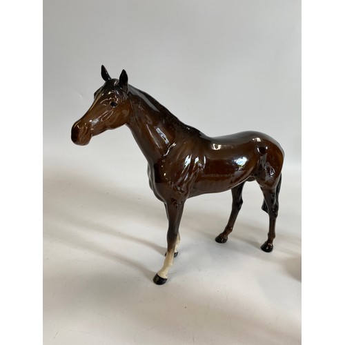 313 - A BESWICK Shetland mare model No. 1033, stands 14cm high, Beswick Stallion 1564, together with x2 Ro... 