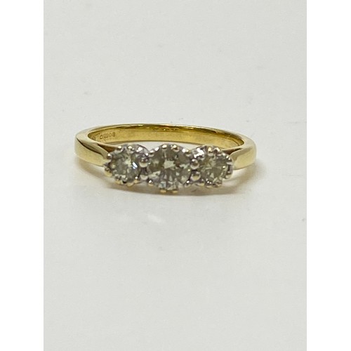 294B - 18ct yellow gold diamond trilogy ring, approx size K, approx 0.50ct, gross weight  3.15g.