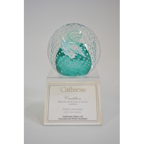 4 - x12 Caithness glass paperweights of various sizes and designs to include; Cauldron, Starlight, Sarac... 