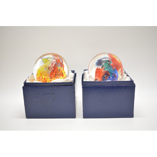 12 - x2  boxed Art Glass Paperweights, one design is an aquarium, one large swirl tornado, height of both... 