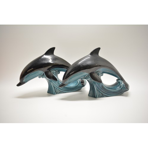 13 - Pair of Poole Pottery Dolphins, maker stamp to base, height 18.5cms