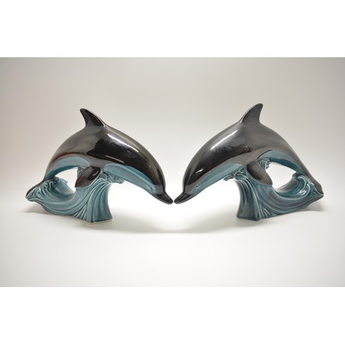 13 - Pair of Poole Pottery Dolphins, maker stamp to base, height 18.5cms