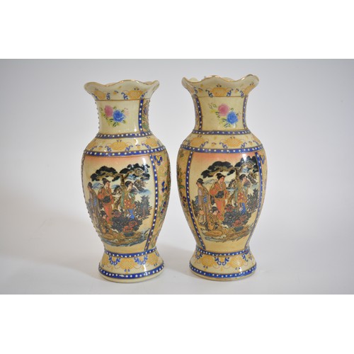 32 - Oriental items group consisting two pairs of vases, Qing Dynasty style warriors in battle famille ve... 