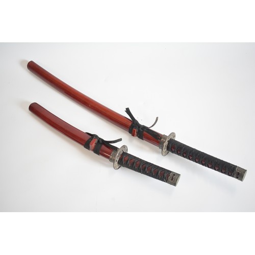 43 - x2 tourist ceremonial Samurai swords with scabbards, for decoration purposes. Collection Only