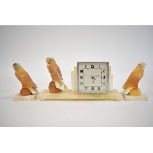 46 - Art Deco style mantle clock with bird garnitures, AF working at time of cataloguing.