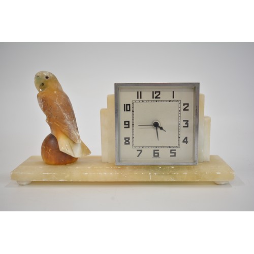 46 - Art Deco style mantle clock with bird garnitures, AF working at time of cataloguing.