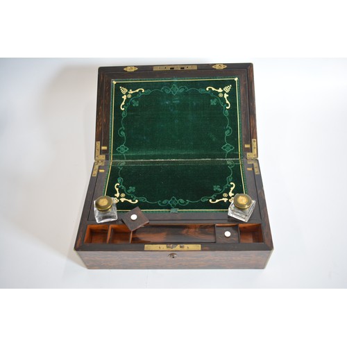 69 - Antique Coromandel stationery box with velvet and gilded interior, inkwells with bronze and gilded t... 