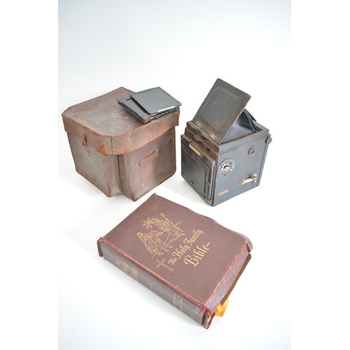 91 - The Holy Family Bible Leather Bound with British made Vintage camera with Leather case and slides