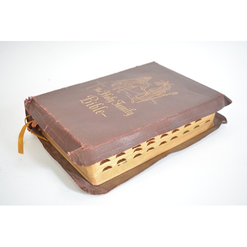 91 - The Holy Family Bible Leather Bound with British made Vintage camera with Leather case and slides