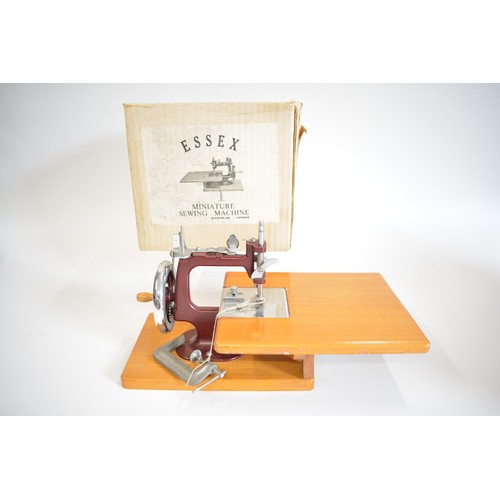 100 - Essex Miniature Sewing Machine complete with original box